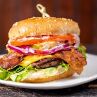 Bacon Burger · Served with lettuce, tomato, onions, pickles, ketchup and mayonnaise.