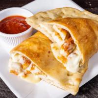 Chicken Calzone · With mozzarella cheese and pizza sauce on the side.