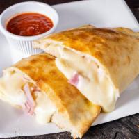 Ham Calzone · With mozzarella cheese and pizza sauce on the side.