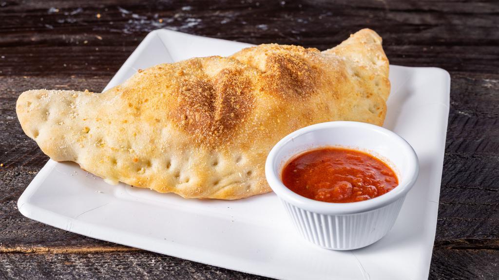 Calzone With Mozzarella Cheese · With pizza sauce on the side.