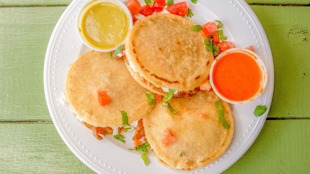 Gorditas · Gorditas are like thick tortillas that we fry a little & we cut it though the middle. We stuff it with refried pinto beans, pico de gallo, queso fresco, your choice of meat & your choice of either mild or hot sauce on the side. Lengua for an extra charge.