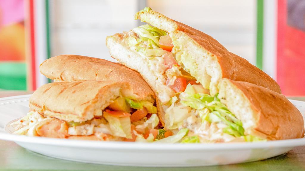 Tortas · Tortas are Mexican sandwiches on a soft bread and filled with your choice of meat , mayonnaise , refried pinto beans , nozzarella melted cheese , lettuce tomatoes , sliced avocado & jalapeño.
