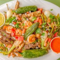 Mix Fajitas / Chicken / Steak / Shrimp · The mix fajitas come with mixed bell peppers, onions, chicken, steak, shrimp all mixed toget...