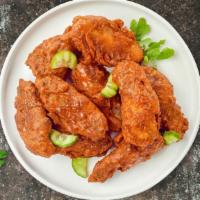 I Can Cajun Wings · Fresh chicken wings breaded, fried until golden brown, and tossed in cajun rub sauce. Served...