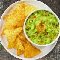 Guac Attack Chips · Guacamole bowl served with chips. Spicy or regular.