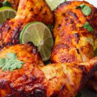 Whole Tandoori Chicken (G) · 4 Leg Quarters marinated in special tandoori masala, cooked in traditional clay oven. (Serve...