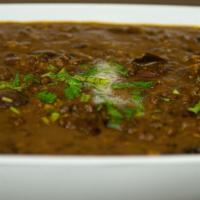 Dal Makhani (V) (G) · Traditional North Indian dish, simmered black lentils, cooked with ginger, garlic, tomatoes,...