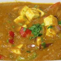 Kadai Paneer (G) · Paneer cubes with variety bell peppers, onions, ginger, garlic, and blend of Indian spices.