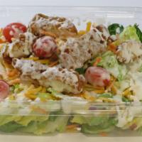 Fried Chicken Salad · Entrée size!  Juicy fried chicken pieces, shredded carrots, cherry tomatoes and shredded che...