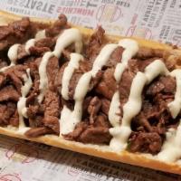 Philly Style Steak Sandwich · Extremely Lean Rib eye  cut up Served on a baguette. Served with choice of  lettuce, tomato,...