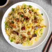A Rice To The Pork · Juicy pork and veggies stir-fried and cooked with rice.