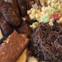 Desayuno Nicaraguans · 2 eggs (over easy, scrambled) gallo pinto, fried plantains, fried cheese and sour cream.