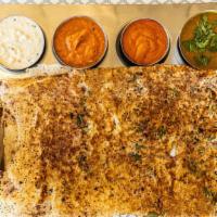 Special Rava Masala Dosa · Semolina crepe mixed with chopped onions, cumin seeds and cilantro stuffed with spiced mashe...
