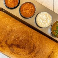 Masala Dosa · Rice crepe stuffed with aromatic spiced mashed potatoes.