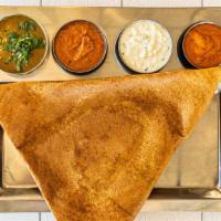 Mysore Masala Dosa · Rice crepe with a spread of a spicy homemade sauce and masala.