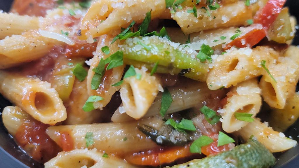Rasta Pasta Primavera · Vegetable medley tossed with a spicy jerk marinara sauce & penne noodles.