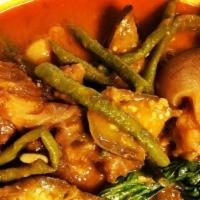 Oxtail Kare-Kare · made with simmered oxtail, vegetables and peanut-based sauce serve with bagoong