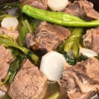 Beef Sinigang · Beef in tamarind base soup with Asian vegetables
