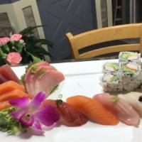 Sushi & Sashimi Combo · Five pcs sushi, nine pcs sashimi, one California roll.