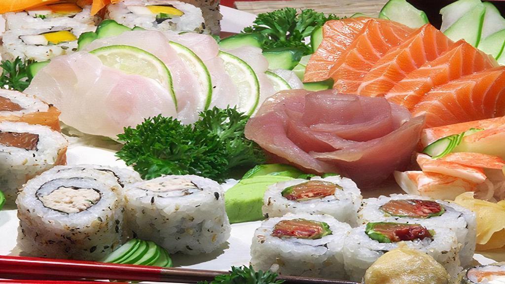 Party Platter B (For 3) · 18 pcs of assorted sushi, rainbow roll, tuna roll and Alaska roll.