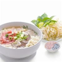 Pho Tai Chin Nam Gau Gan Sach · Beef Noodle soup with Rare steak, welldone brisket, flank, Fatty Brisket, Tendon and Tripe