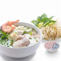 Hu Tieu Dai Hai Duong (Nuoc) · Hai duong style egg noodle soup pork, shrimp. Squid, fish ball. Quail eggs. Pork's heart and...