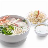 Hu Tieu Tom Thit (Nuoc) · Rice noodle soup with shrimp and pork,  green onions, fried onions, cilantro, celery, chives...