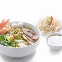 Mi Nam Vang (Khô) · Nam Vang DRY egg noodle soup pork, shrimp. Squid, fish ball. Quail eggs. Pork's heart and to...