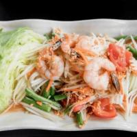 Papaya Salad (Som Tum)  · Shredded green papaya and carrot mixed with. tomato, green bean and shrimps. Tossed in lime....