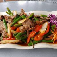 Pad Prig Khing · Sauteed your choice of meat with green bean,. onion, bell pepper and basil in Prig Khing chi...