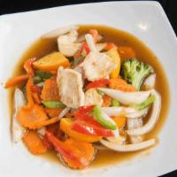 Thai Fusion Orange Sauce · Sauteed broccoli, bell pepper, onion, carrot, fresh. orange and your choice of meat in homem...