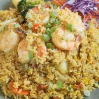 Curry Fried Rice  · Stir fried steamed jasmine rice with egg, prawns,. pineapple, onion, carrot, broccoli, cabba...