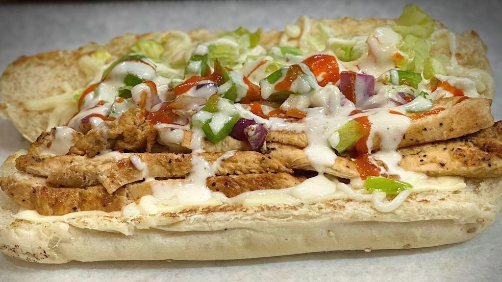 Grilled Chicken Sub · Chicken shredded cheddar cheese, Mozzarella, mayo, red onion, tomato, and lettuce.