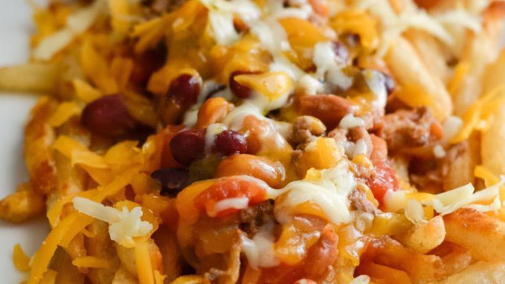 Chili Cheese Fries · Seasoned fries with squeezed or sliced cheese and chilli.