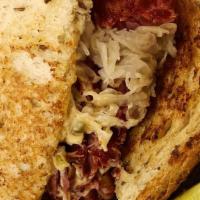 The Carnegie · House braised corned beef, melted swiss cheese, sauerkraut and house made thousand island dr...