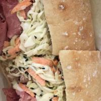 The Hell'S Kitchen · House-made roast beef and corned beef, pastrami and roasted turkey, topped with our from scr...