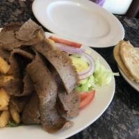 Gyro Platter · Sliced seasoned beef, lamb cooked on an open split, served with Greek salad, French fries, p...