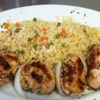 Chicken Shish Kebob · Tender pieces of marinated chicken, green pepper, onions, and tomatoes. Served with rice. Se...