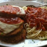 Eggplant Parmesan · Fresh eggplant dipped in our sauce, topped with melted cheese, served with spaghetti, and ma...