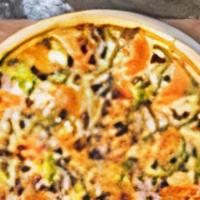 Garden Veggie Pizza · Onions, green peppers, green and black olives, fresh tomatoes and mushrooms baked on a hand-...