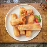 Spring Roll · (4 pieces) Seasonal vegetables wrapped in rice wrapper and fried until golden crisp.