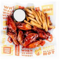 12 Traditional - Large · 12 traditional wings served with your choice of fries, honey slaw or veggies, a 20 oz. drink...