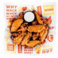 9 Traditional - Regular · 6 traditional wings tossed in up to 2 signature sauces of your choice.