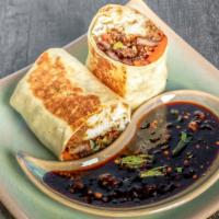 Garlic Spiced Beef With Scallions Burrito · Spicy caramelized beef with scallions, garlic and bell peppers.