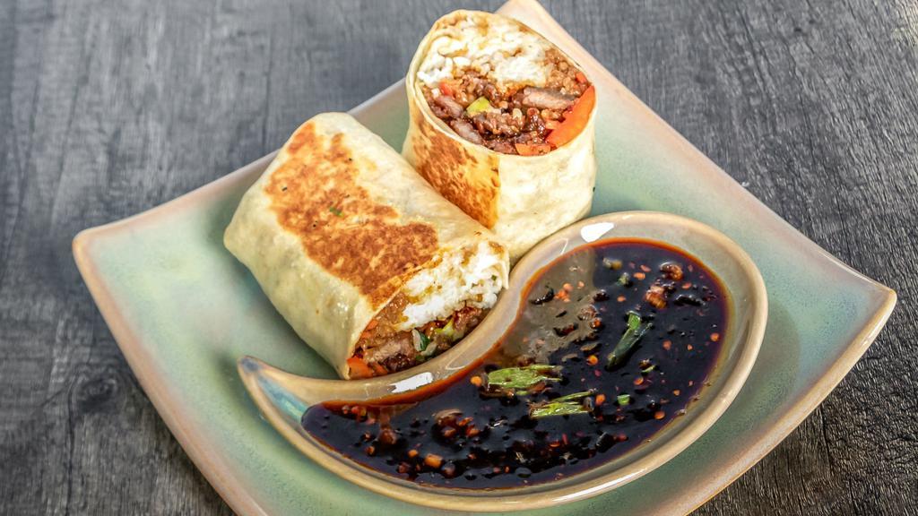 Garlic Spiced Beef With Scallions Burrito · Spicy caramelized beef with scallions, garlic and bell peppers.