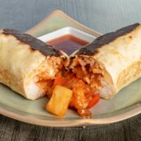 Sweet & Sour Chicken Burrito · Crispy battered chicken, classic homestyle sweet and sour sauce. Served with pineapple, bell...