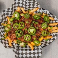 Dirty Fries · Smothered in cheese sauce and our BBQ pulled pork, topped with freshly sliced jalapeños and ...