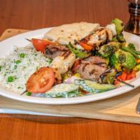 Hungry'S Kabob Plate · Tender and juicy skewers of beef tenderloin, grilled all-natural chicken or a combination of...