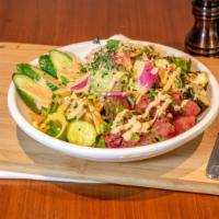 Ahi Tuna Poke Bowl · Organic brown rice, ginger-glazed Brussels sprouts, Persian cucumbers, scallion, avocado rel...