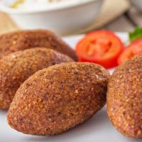 Kibbie Balls · Traditional lebanese appetizer which the outer shell made from ground beef and bulgur wheat ...